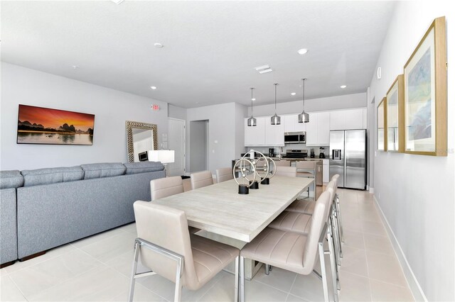 7770 Sandy Ridge Dr Unit 142, Kissimmee, FL 34747 - dining area featuring light tile patterned floors and recessed lighting