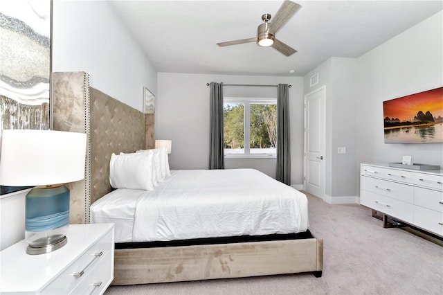 7770 Sandy Ridge Dr Unit 142, Kissimmee, FL 34747 - bedroom featuring light carpet and a ceiling fan
