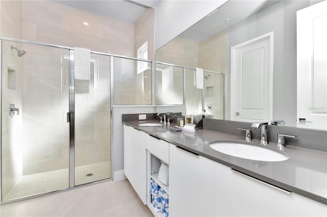 7770 Sandy Ridge Dr Unit 142, Kissimmee, FL 34747 - bathroom featuring double vanity and a stall shower