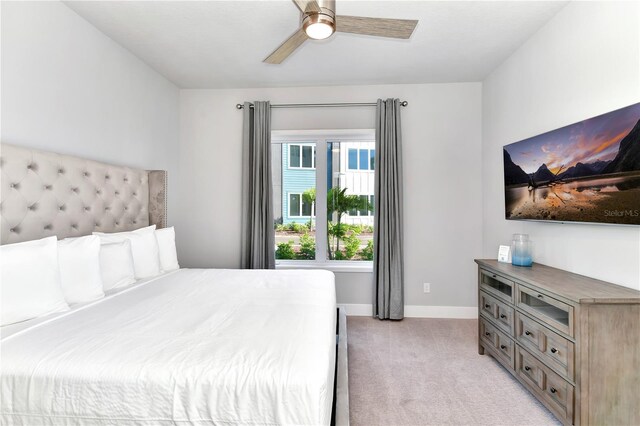 7770 Sandy Ridge Dr Unit 142, Kissimmee, FL 34747 - bedroom featuring light colored carpet and a ceiling fan