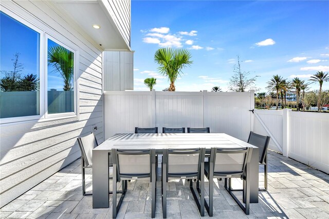 7770 Sandy Ridge Dr Unit 142, Kissimmee, FL 34747 - view of patio featuring outdoor dining space