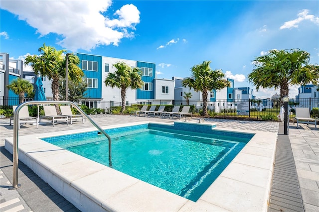 7770 Sandy Ridge Dr Unit 142, Kissimmee, FL 34747 - community pool featuring a residential view and a patio area