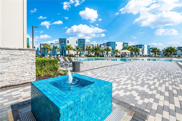 7770 Sandy Ridge Dr Unit 142, Kissimmee, FL 34747 - community pool with a patio