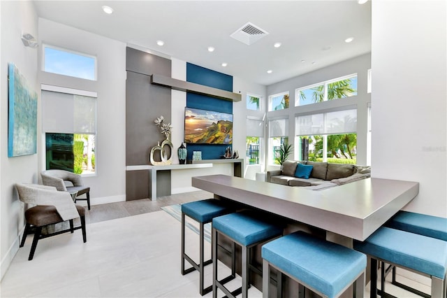 7770 Sandy Ridge Dr Unit 142, Kissimmee, FL 34747 - dining area featuring recessed lighting and a towering ceiling