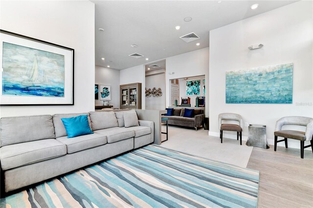 7770 Sandy Ridge Dr Unit 142, Kissimmee, FL 34747 - living room featuring recessed lighting and wood finished floors
