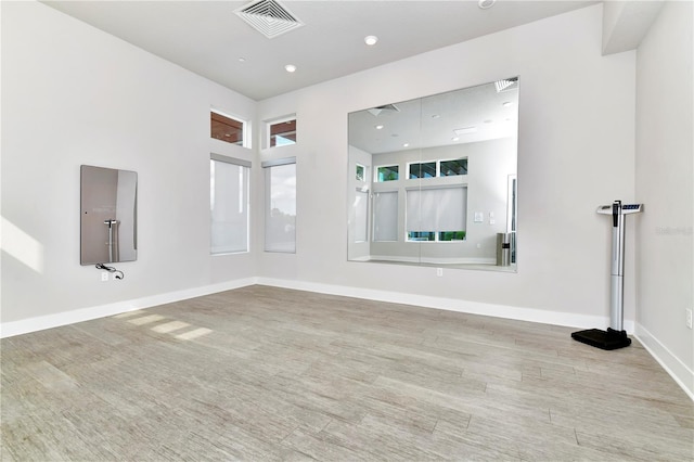 7770 Sandy Ridge Dr Unit 142, Kissimmee, FL 34747 - spare room with baseboards and wood finished floors
