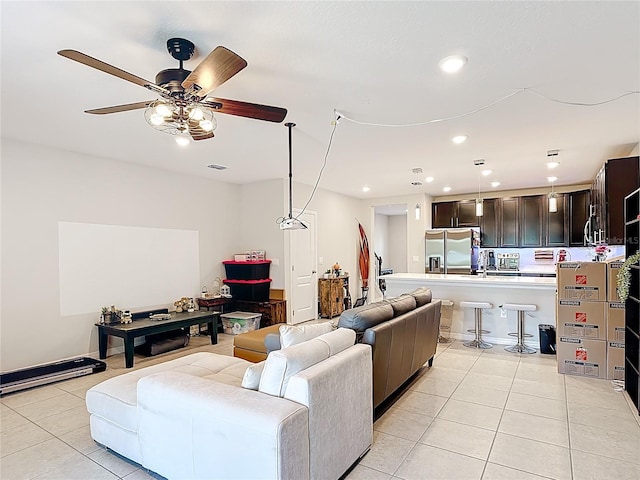 4850 Coral Castle Dr, Kissimmee, FL 34746 - living room with light tile patterned floors, recessed lighting, and a ceiling fan