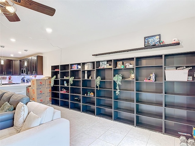 4850 Coral Castle Dr, Kissimmee, FL 34746 - living area with ceiling fan, light tile patterned floors, and recessed lighting