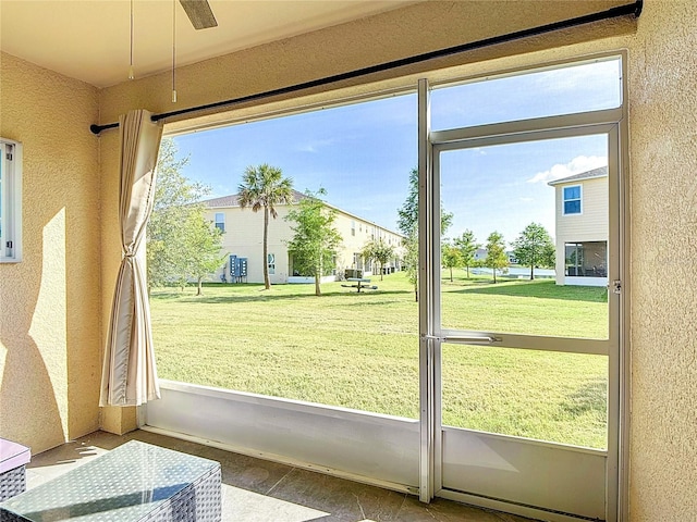 4850 Coral Castle Dr, Kissimmee, FL 34746 - doorway featuring a textured wall and wood finished floors