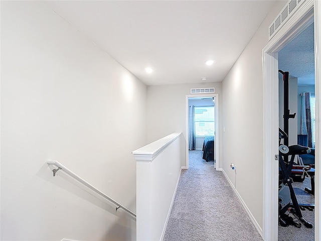 4850 Coral Castle Dr, Kissimmee, FL 34746 - hallway with an upstairs landing, carpet, and recessed lighting