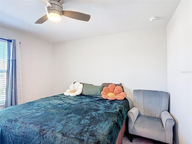 4850 Coral Castle Dr, Kissimmee, FL 34746 - bedroom with a textured ceiling and ceiling fan