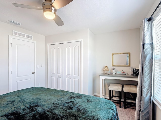 4850 Coral Castle Dr, Kissimmee, FL 34746 - carpeted bedroom featuring ceiling fan and a closet