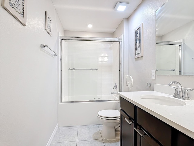 4850 Coral Castle Dr, Kissimmee, FL 34746 - full bathroom with vanity, tile patterned flooring, and shower / bath combination with glass door