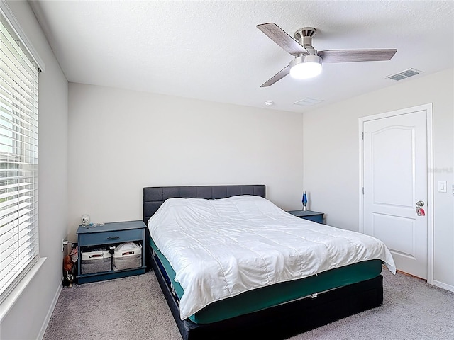4850 Coral Castle Dr, Kissimmee, FL 34746 - bedroom featuring light carpet and ceiling fan
