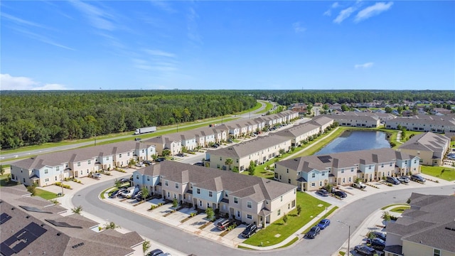 4850 Coral Castle Dr, Kissimmee, FL 34746 - aerial view of residential area with a forest and a large body of water