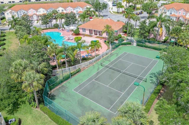 4850 Coral Castle Dr, Kissimmee, FL 34746 - view of tennis court with a community pool
