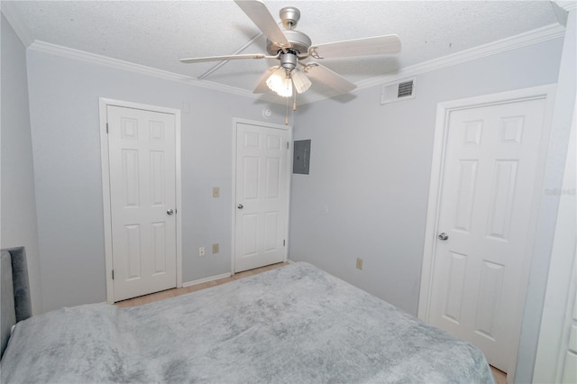 139 Oyster Bay Cir Unit 200, Altamonte Springs, FL 32701 - bedroom featuring crown molding, electric panel, a textured ceiling, light wood finished floors, and ceiling fan
