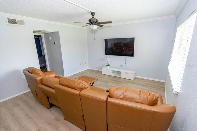 139 Oyster Bay Cir Unit 200, Altamonte Springs, FL 32701 - living area with light wood-style flooring, ceiling fan, ornamental molding, and baseboards