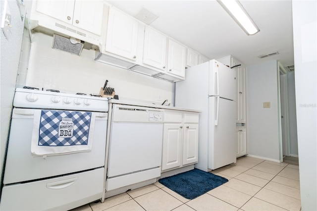 139 Oyster Bay Cir Unit 200, Altamonte Springs, FL 32701 - kitchen featuring white appliances, white cabinets, light tile patterned floors, and light countertops