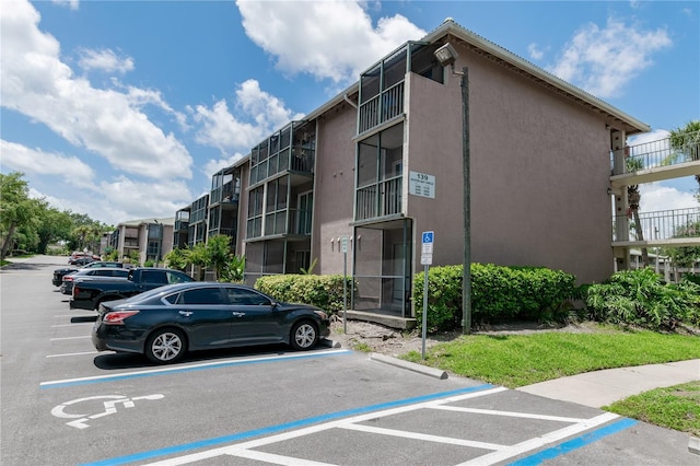 139 Oyster Bay Cir Unit 200, Altamonte Springs, FL 32701 - view of building exterior featuring uncovered parking