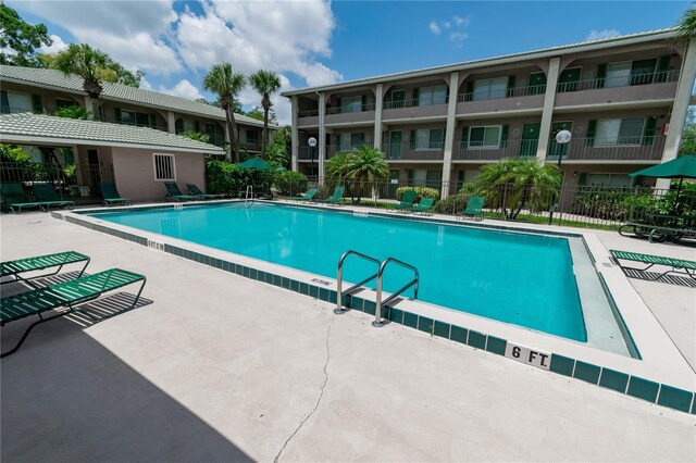 139 Oyster Bay Cir Unit 200, Altamonte Springs, FL 32701 - community pool featuring a patio