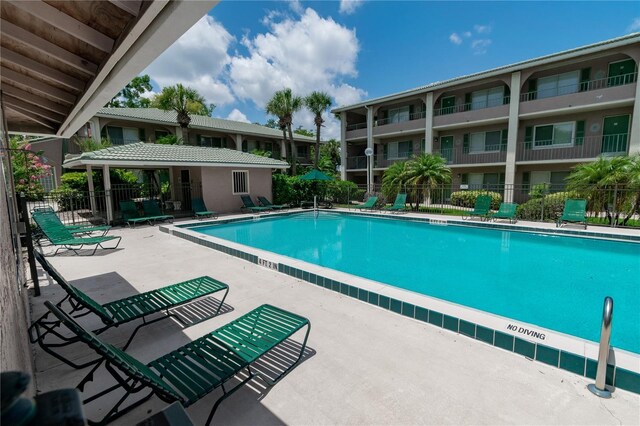 139 Oyster Bay Cir Unit 200, Altamonte Springs, FL 32701 - community pool with a patio area