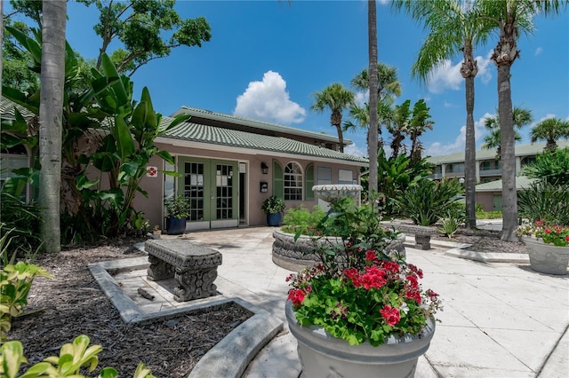 139 Oyster Bay Cir Unit 200, Altamonte Springs, FL 32701 - rear view of property with french doors, a patio, and stucco siding