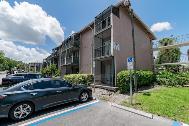 139 Oyster Bay Cir Unit 200, Altamonte Springs, FL 32701 - view of property featuring uncovered parking