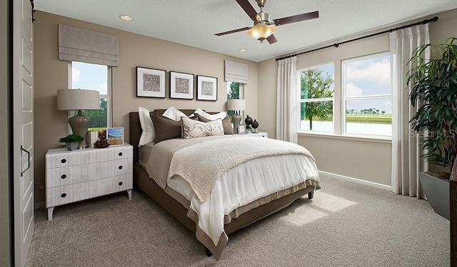 223 Thornberry Way, Palm Coast, FL 32164 - bedroom with baseboards, dark carpet, recessed lighting, and ceiling fan