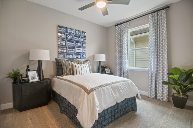 215 Thornberry Way, Palm Coast, FL 32164 - carpeted bedroom with baseboards and ceiling fan
