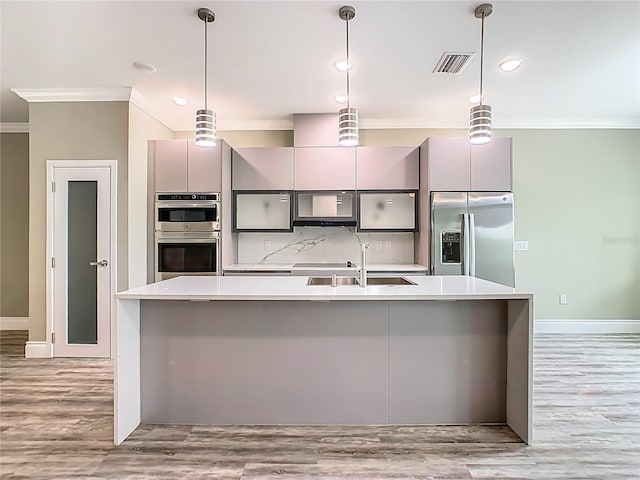 1870 Brentwood Ct, Davenport, FL 33837 - kitchen with stainless steel appliances, crown molding, a sink, gray cabinetry, and modern cabinets