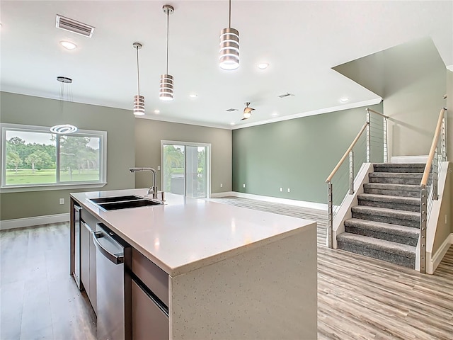 1870 Brentwood Ct, Davenport, FL 33837 - kitchen featuring a sink, stainless steel dishwasher, light wood-type flooring, baseboards, and recessed lighting