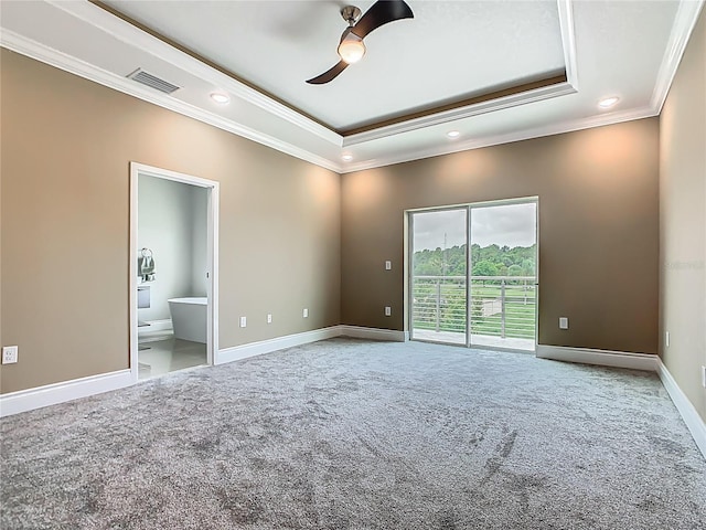 1870 Brentwood Ct, Davenport, FL 33837 - carpeted empty room featuring a tray ceiling, crown molding, recessed lighting, ceiling fan, and baseboards