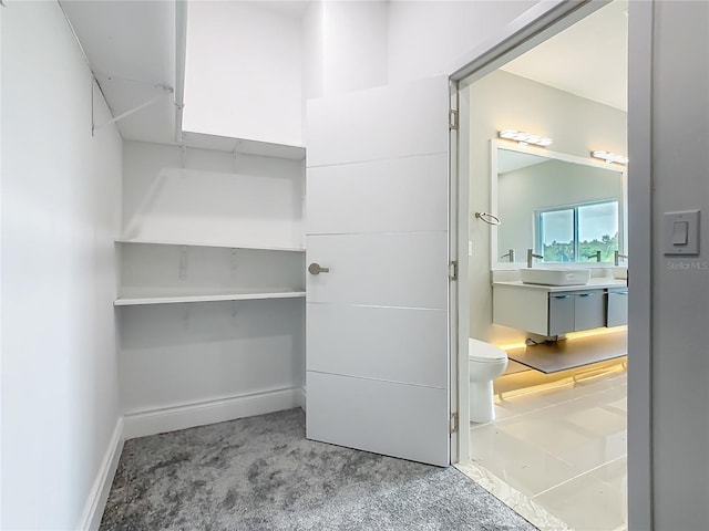 1870 Brentwood Ct, Davenport, FL 33837 - spacious closet featuring light carpet and a sink