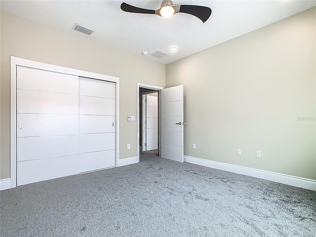1870 Brentwood Ct, Davenport, FL 33837 - unfurnished bedroom with baseboards, carpet flooring, ceiling fan, and a closet