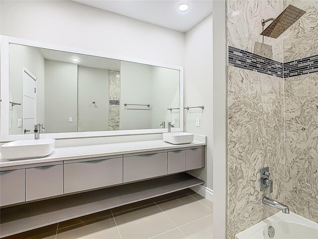 1870 Brentwood Ct, Davenport, FL 33837 - bathroom featuring double vanity, tile patterned flooring, baseboards,  shower combination, and recessed lighting