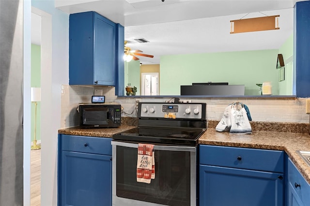 1566 Providence Blvd, Deltona, FL 32725 - kitchen featuring electric range, blue cabinetry, black microwave, backsplash, and a ceiling fan