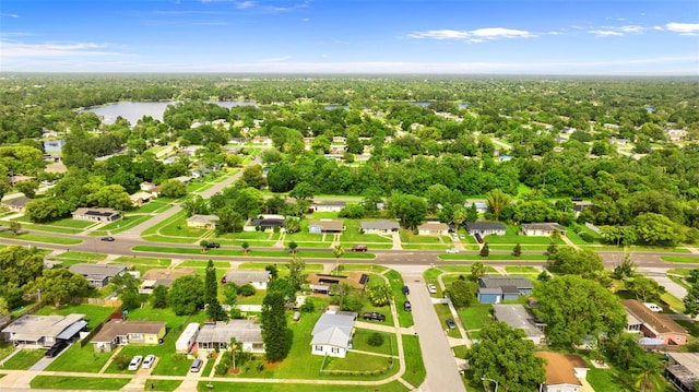 1566 Providence Blvd, Deltona, FL 32725 - aerial perspective of suburban area featuring a large body of water