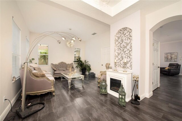 5231 Lemon Twist Ln, Windermere, FL 34786 - living area featuring arched walkways and wood finished floors