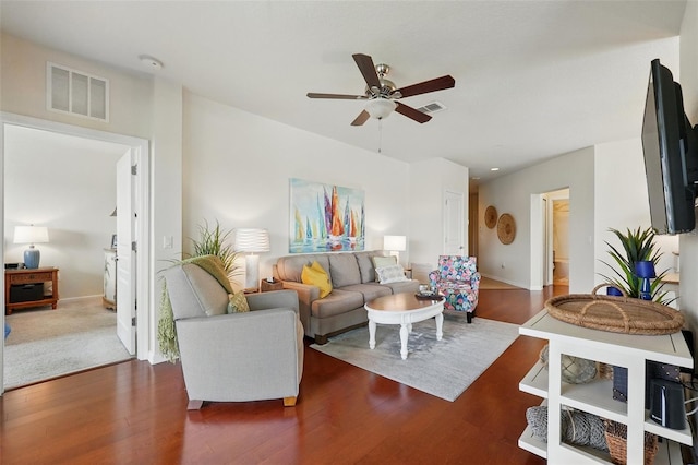 1225 Bella Cara Ct Unit 1, Davenport, FL 33896 - living room featuring a ceiling fan, wood finished floors, and baseboards