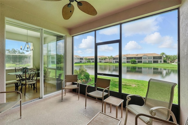 1225 Bella Cara Ct Unit 1, Davenport, FL 33896 - sunroom featuring a water view, ceiling fan, a residential view, and a chandelier