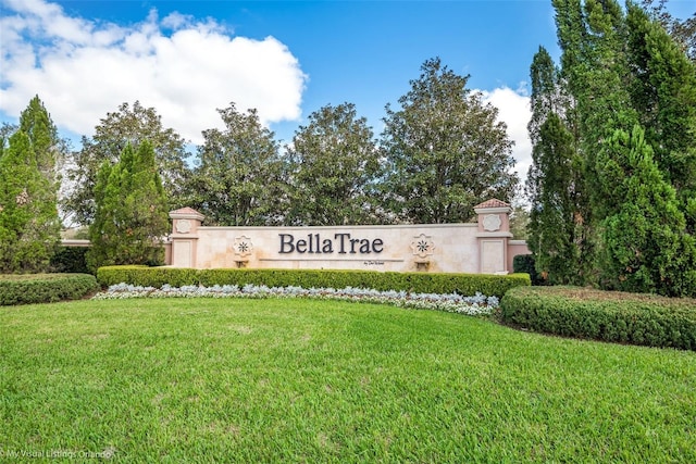1225 Bella Cara Ct Unit 1, Davenport, FL 33896 - community sign with a lawn