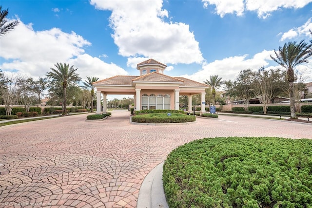 1225 Bella Cara Ct Unit 1, Davenport, FL 33896 - view of home's community with curved driveway and a gazebo