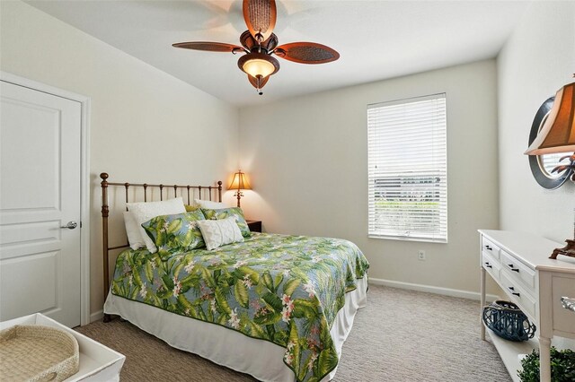 1225 Bella Cara Ct Unit 1, Davenport, FL 33896 - bedroom featuring light colored carpet and a ceiling fan