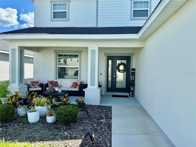 1016 Cascade Dr, Davenport, FL 33837 - doorway to property featuring a porch, a shingled roof, and stucco siding