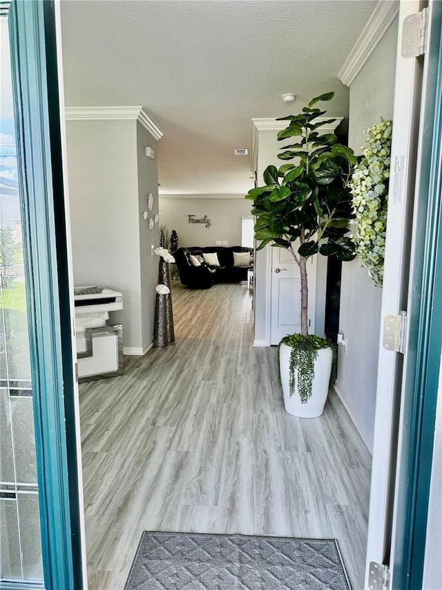 1016 Cascade Dr, Davenport, FL 33837 - corridor with ornamental molding and wood finished floors