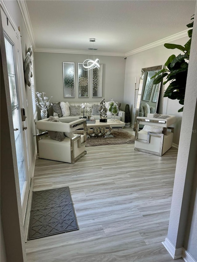 1016 Cascade Dr, Davenport, FL 33837 - living room with plenty of natural light, wood finished floors, crown molding, and a chandelier