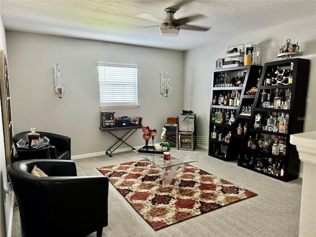 1016 Cascade Dr, Davenport, FL 33837 - sitting room with carpet flooring, ceiling fan, and a textured ceiling