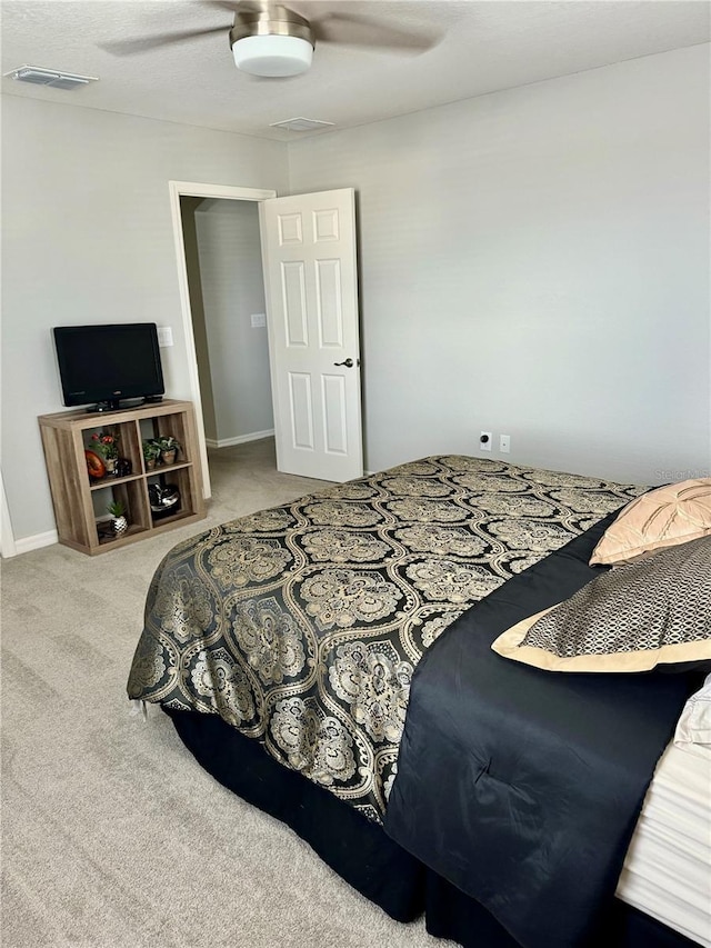1016 Cascade Dr, Davenport, FL 33837 - bedroom with carpet floors and a ceiling fan