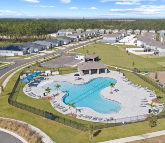 1016 Cascade Dr, Davenport, FL 33837 - aerial view of residential area with a pool area